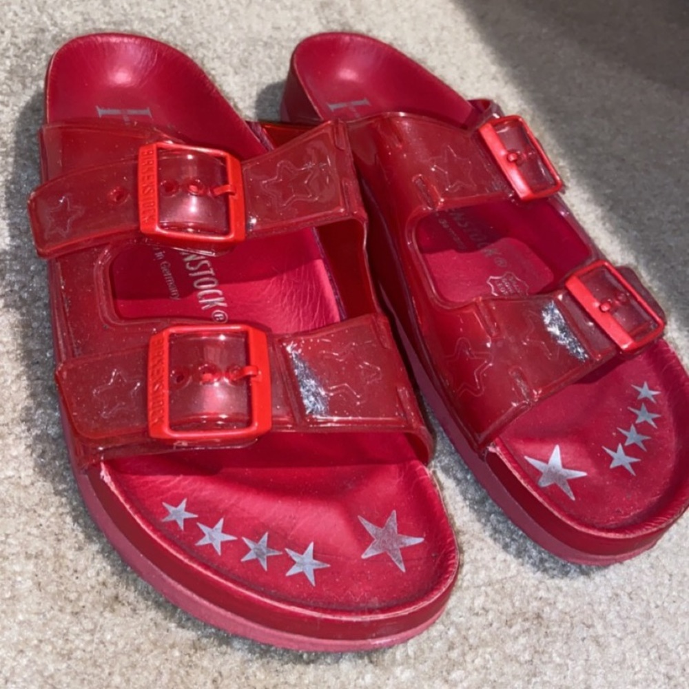 Red Birkenstocks with stars and glitter in buckles